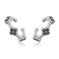 Close-up of clover ear cuffs with blue and black crystals in polished silver finish - Platinum Blue Zirconia