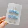 Close-up of two light blue glitter heart hair clips for girls on display card - 5# Blue Heart Pair Clips