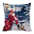 Detail of Christmas pillow featuring Santa Claus on a bench with rabbits and gift bag - Santa on Bench