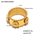 Franse reliëf bloem brede band ring van titanium staal met een 18k gouden afwerking - US 6 / Ring / Goud