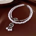 Elegant silver-tone double-layer butterfly pearl necklace with sparkling rhinestones - Silver White Double-layer Pearl S Buckle Necklace