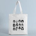 White canvas tote bag with black line cartoon face print on a light blue background - STD239-H/Minimalist Face