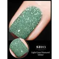 Macro detail of pale green diamond glitter gel nail polish with intense reflective shine - 8ml / Light Cyan SZ13