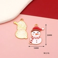 Detailed view of enamel snowman pendant with dimensions 26mm x 16mm and golden metal frame - Snowman
