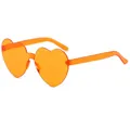 Fashionable heart-shaped rimless sunglasses in translucent bright orange jelly color - Orange Red