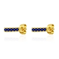 Detailed macro view of gold-plated stud earrings featuring six inset blue zircon stones - Blue