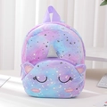 Macro detail of soft tie-dye plush unicorn bag with shimmering silver stars and moon - Purple Star Squinting