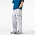 Pantaloni cargo grigio chiaro a gamba larga con tasche e cintura regolabile - M / Grigio chiaro