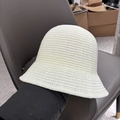 Detailed close-up of the thick knit texture on this cream-colored bucket sun hat - M (56-58cm) / White