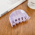Elegant medium-sized purple marbled acetate hair claw clip on a rustic wooden desk - 6.8cm / Purple Striped