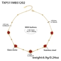 Detail view of gold stainless steel necklace with five red faceted glass stones and clasp - Gold Necklace - Red Glass Stone