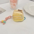 Detail of yellow tweed mini earphone pouch with pink knotted lanyard decor - Yellow