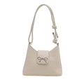 White minimalist PU leather underarm bag with a metal bow detail and adjustable strap - White