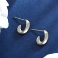 Polished silver stainless steel J-shaped earrings on blue textured background - Style A (J Hook) / Silver