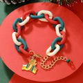 Detailed view of red and green acrylic Christmas bracelet with reindeer charm - D1054 (Chunky Chain Cartoon Reindeer)