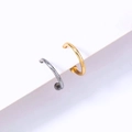 Macro view of minimalist U-shaped nose rings in silver and gold metallic finish - Simple Semicircle Hoop / Gold and Silver Set