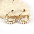 Detailed close-up of gold C-shaped hoop earrings with elegant double-row faux pearl inlay - Style 3/Double-Row Pearl C-Shape Hoop