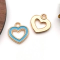 Golden heart charms set including hollow and light blue enamel styles for DIY jewelry - Hollow Peach Heart Shape (11955)