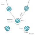 Detail view of hypoallergenic stainless steel jewelry set with blue enamel flower charms - Silver Sky Blue Flower Style (SE250001S)