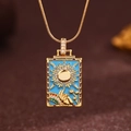 Vintage golden sun tarot card pendant necklace with blue enamel and sparkling rhinestones - Gold (X6041GD)