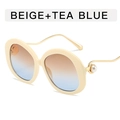 Beige ronde zonnebril met thee blauwe gradiënt lenzen en parel metalen veren - Beige Montuur Thee Blauwe Glazen