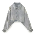 Women's light grey distressed denim jacket with ripped details and zip-up front - XS / Light Blue