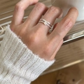 Silver double-layered stacking rings with round gemstone inlay worn by a model - JZ0166 (Gem Stacking)