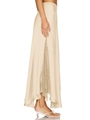 Detail of champagne satin midi skirt showing elegant side lace patchwork and silky texture - S / Champagne