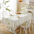 Waterproof linen tablecloth with green floral embroidery and decorative tassel edges - 140x100 / Embroidered Green Vines + Tassels