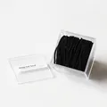Pack of 50 black high-elasticity seamless hair bands in a transparent acrylic storage box - 50 Pcs Boxed / Black Ribbed