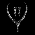 Close-up of bridal jewelry set with black gemstones and crystals on black background - Black Rhinestone Silver Plated