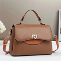 Chic brown litchi pattern leather handbag with caramel handles and gold metal lock - Brown
