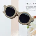 Lightweight round kids sunglasses in matte beige frame with dark polarized lenses C5 - Grey Frame Grey Lens