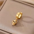 Gold stainless steel punk hoop earring with skull pendant on textured jewelry box - Gold Skull