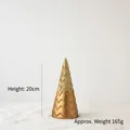Golden 20cm mini Christmas tree ornament with glitter top and wavy textured base - 20cm