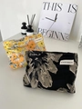 Floral jacquard travel makeup bag in yellow and black patterns with zipper closure - Black Large Lotus