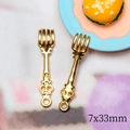 Macro view of 7x33mm golden alloy miniature fork pendants for dollhouse DIY projects - Gold Small Fork
