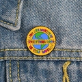 Macro detail of round enamel mental health pin on denim with inspirational quote - XZ4817-Inspirational Earth Pattern
