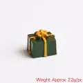 Miniature resin Christmas gift box in dark green with yellow ribbon, size 15mm x 12mm - Green Gift Box