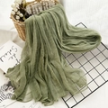 Green gradient silk scarf with crinkle texture displayed on a wooden basket - 190cmx75cm / Army Green