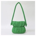 Detail of green puffy cloud shoulder bag featuring soft ruched texture and padded strap - Green