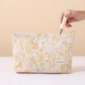 Beige canvas makeup bag with yellow floral embroidery and silver zipper closure - Beige Cotton Linen Large