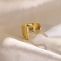 Adjustable golden open ring with letter P design on elegant silk fabric background - Letter P / Gold