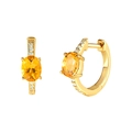 Macro shot of gold hoop earrings featuring a yellow gemstone and sparkling white zircons - Gold Oval Stud - Amber/White Stones