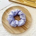 Lavender purple scrunchie with white polka dots made of soft fabric for bun hairstyles - Purple with White Polka Dots
