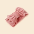 Close-up of pink corduroy baby headband featuring a soft textured vertical ribbed bow - 18.5*8.5cm / Scarlet