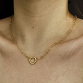 Close-up of 18K gold-plated paperclip chain necklace with round pendant on model - Paperclip Chain