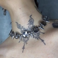 Close-up of Y2K star necklace with silver spikes and black beads on a model neck - Silver-Tone Cone Spike Square Artificial Bead Necklace (X3790A)