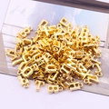 Detailed macro view of assorted golden alloy alphabet pendants for DIY jewelry making - Letter Pendant with Ring 3 Plated Gold