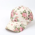 Close-up of beige baseball cap with elegant pink rose floral print and leaf details - Adjustable / Beige